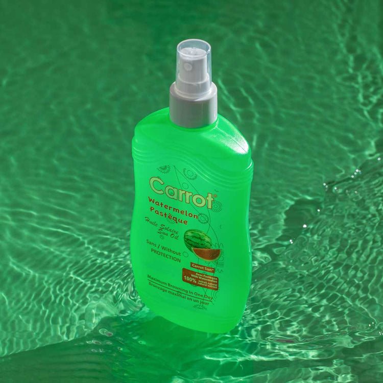 Carrot Sun Watermelon tanning oil spray bottle close-up