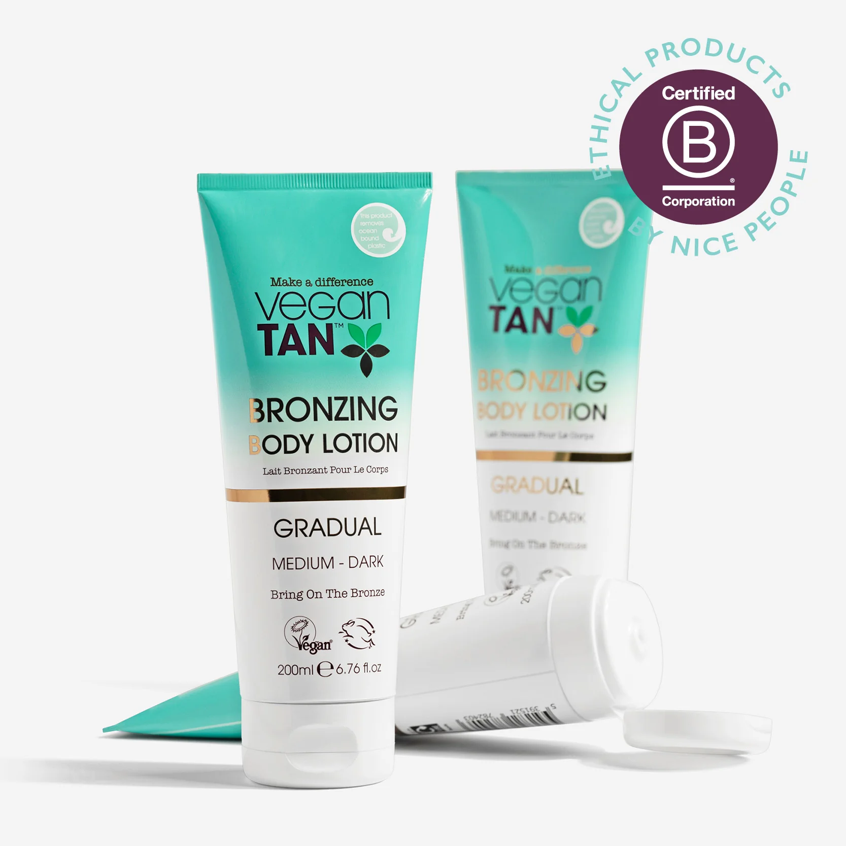 Manufacturer promotional photograph showing VeganTan Medium Dark 200ml lotion tubes